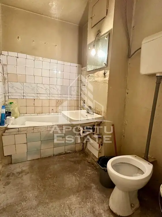 Apartament cu 2 camere, parter inalt, bloc anvelopat, zona Dambovita