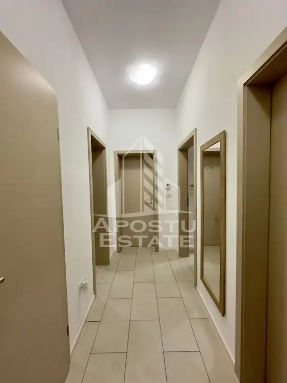 Apartament cu 2 camere decomandat, dressing, gradina proprie de 55mp