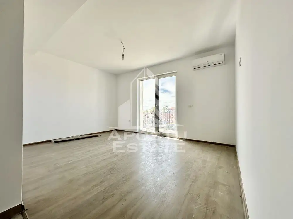 Apartament cu 2 camere, decomandat, situat in vatra satului