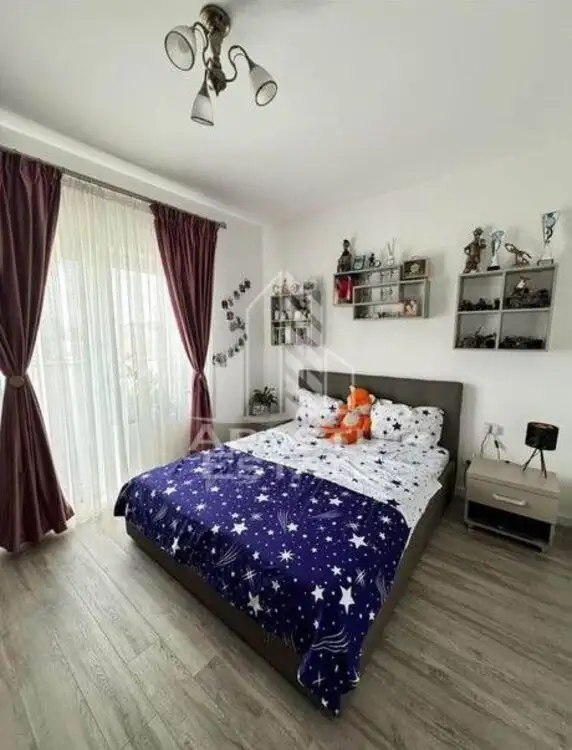 Apartament cu 2 camere, mobilat si utilat,cu balcon si loc de parcare