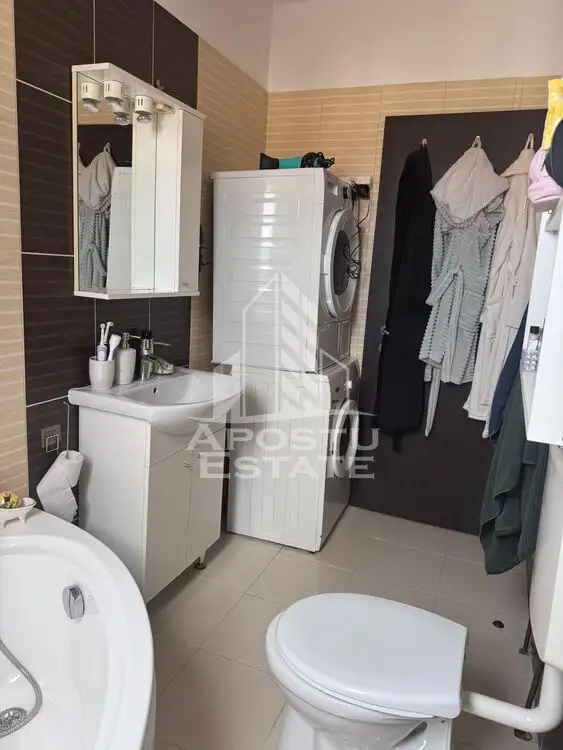 Apartament cu 3 camere in zona Dambovita, centrala proprie