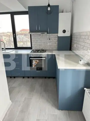 Prima închiriere: Apartament ultrafinisat cu 2 camere, parcare privată, zonă centrală