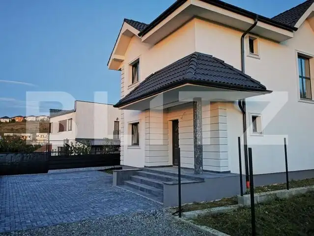 Casa individuala , 124 mp utili , 940 mp teren, intrare Dezmir