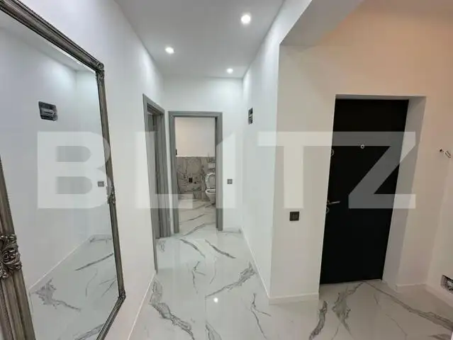 Apartament cu 2 camere, finisat, 52mp, etaj intermediar zona Regal