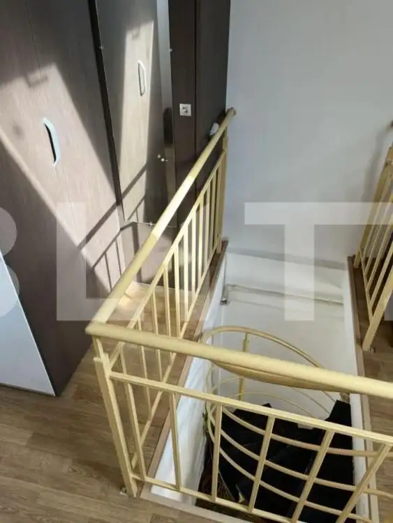 Apartament de 60mp desfășurat pe două niveluri, localizat central în Apahida