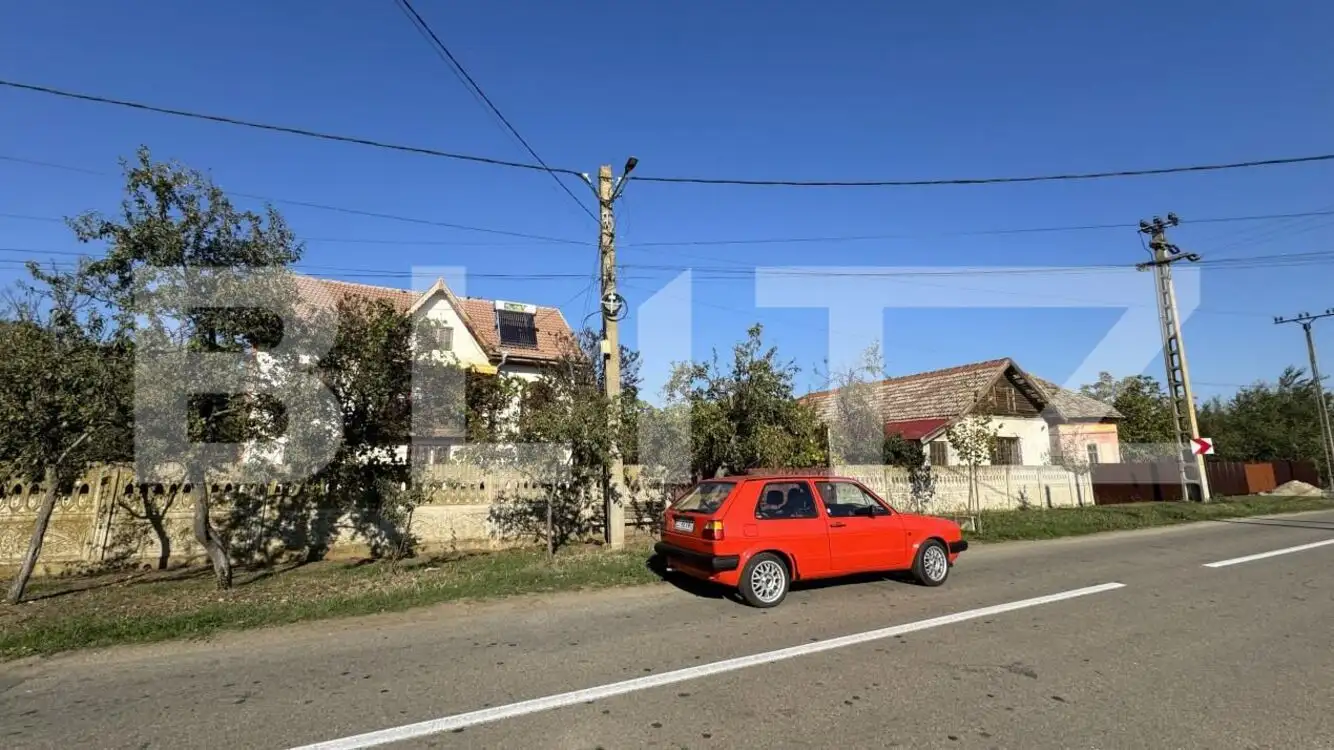 Casă P + E cu anexe - 134 mpc, teren 4.412 mp, două fronturi mari, zona-Giubega