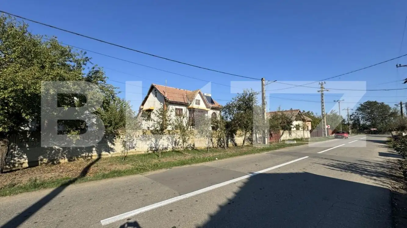 Casă P + E cu anexe - 134 mpc, teren 4.412 mp, două fronturi mari, zona-Giubega