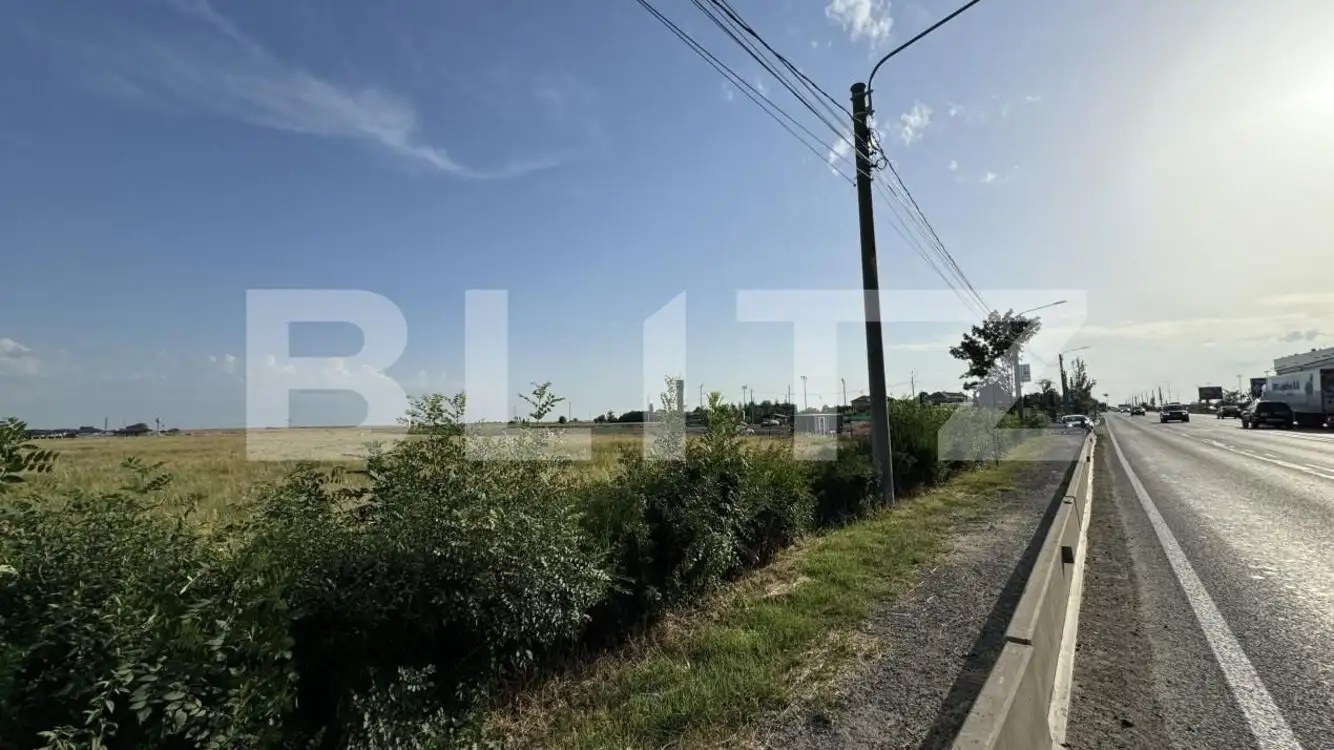 Teren intravilan 42.000 mp, deschidere 133 m la DE574, zona Aeroportului