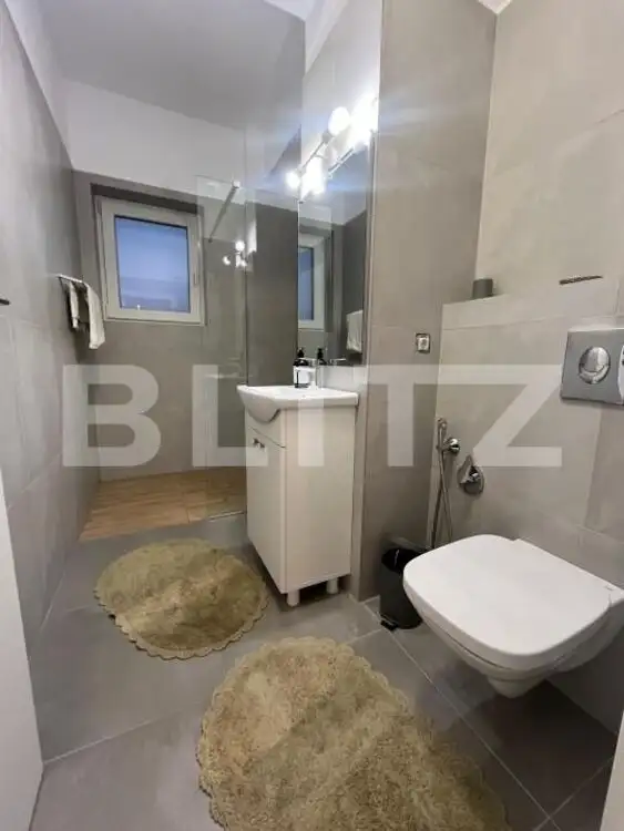 Apartament cu 2 camere, 57 mp, loc de parcare, zonă centrală