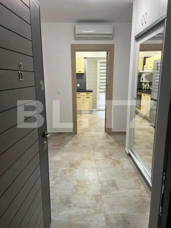 Apartament cu 2 camere, decomandat, 66 mp, centrala si AC, zona Bacriz