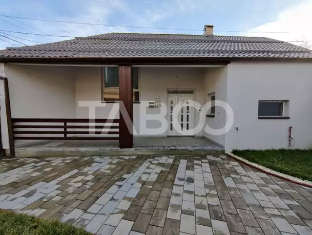 Casa individuala 4 camere 2 bai loc de parcare teren Cisnadie Sibiu