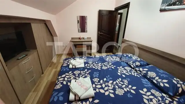 Apartament de inchiriat  56 mpu 2 camere mansarda in vila Selimbar