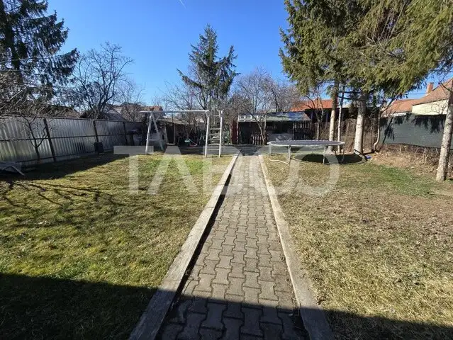 Casa individuala 4 camere 130 mpu teren 612 mp garaj Piata Cluj Sibiu