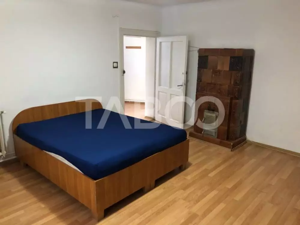 Casa individuala 85 mpu cu teren 560 mp pivnita curte Piata Cluj