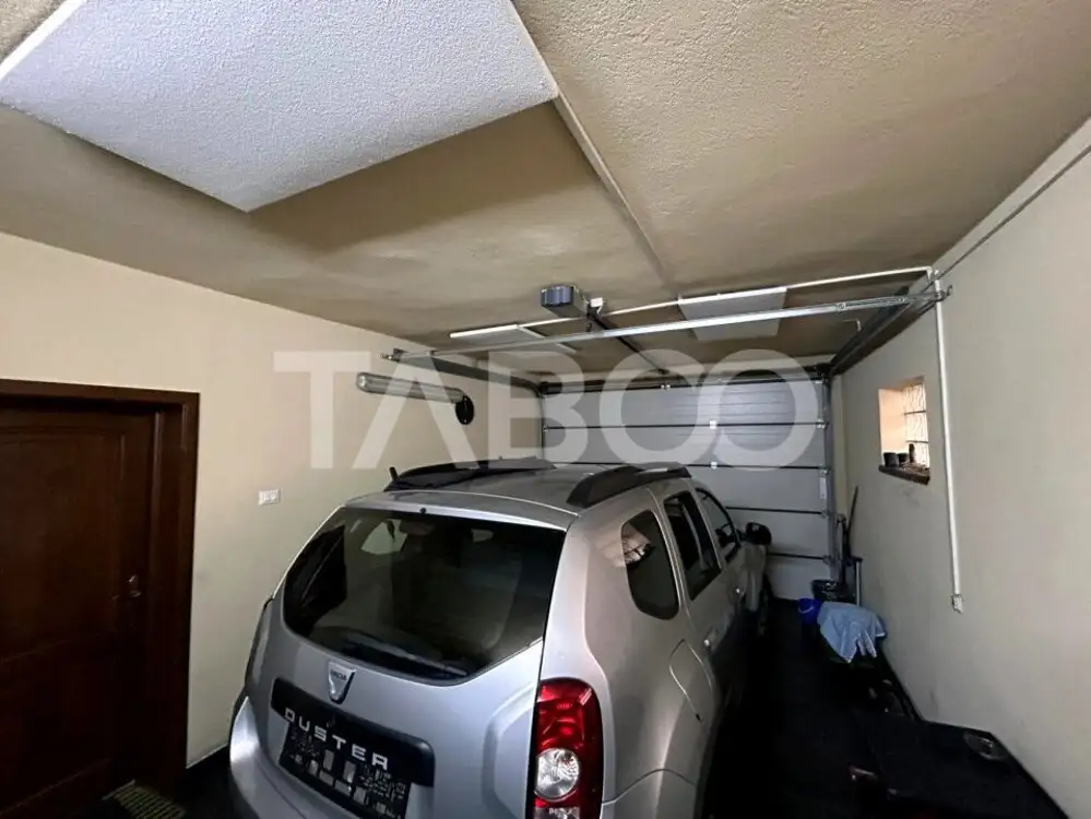 Casa de vanzare cu 5 camere 2 balcoane 3 bai garaj incalzit in Sibiu