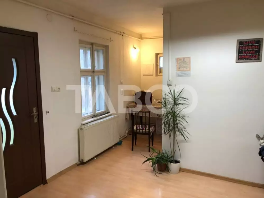 Casa individuala 85 mpu cu teren 560 mp pivnita curte Piata Cluj